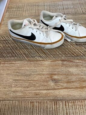 Nike White Sneakers with Black Swoosh and Tan Trim